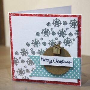 StickerKitten Penguins and Presents Christmas cards - cute wooden gift and silver heat embossed snowflake card