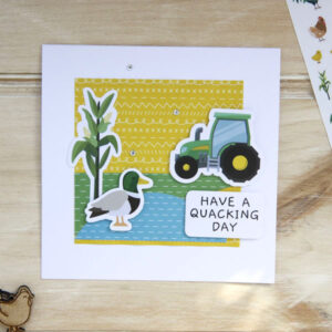 Handmade card showing tractor, duck and 'have a quacking day'