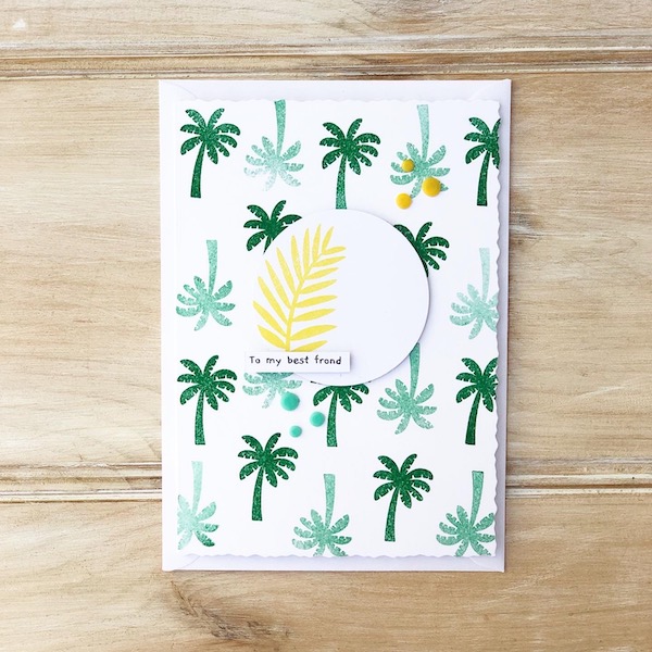 Stamped palm tree card using StickerKitten Palm House stamp set. Green palm tree background and yellow fern