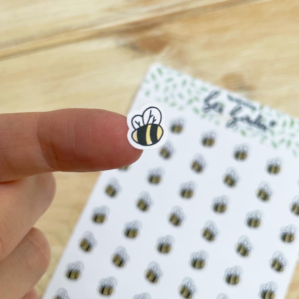 Cute bee sticker close up