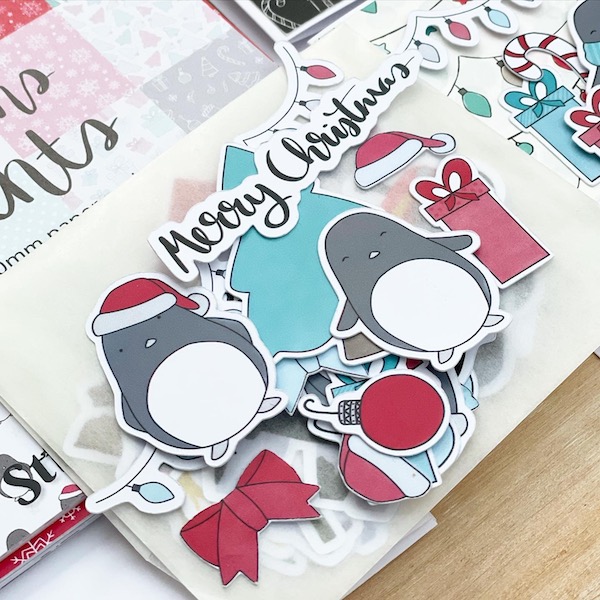 Close up of cute penguins paper cardmaking toppers