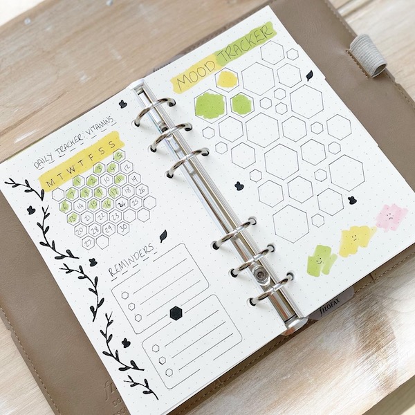 Bee themed bullet journal spread - mood tracker, health tracker and to do