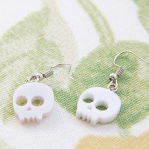 Skull earrings by StickerKitten