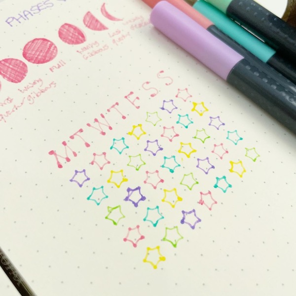 colourful pastel star grid tracker planner page
