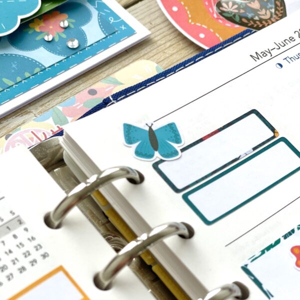 Blue butterfly sticker on planner page