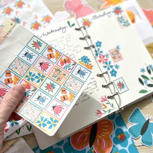 Journalling with stickers – decorating a dot grid page with postage stamp style planner stickers