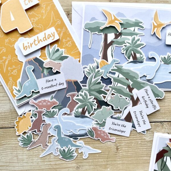 Dinosaur scene ephemera - cardmaking toppers with mini dinosaurs and habitats