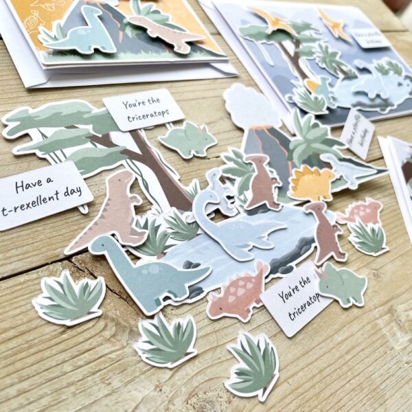 Dinosaur scene ephemera - cardmaking toppers with mini dinosaurs and habitats