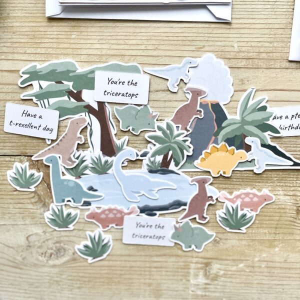 Dinosaur scene ephemera - cardmaking toppers with mini dinosaurs and habitats