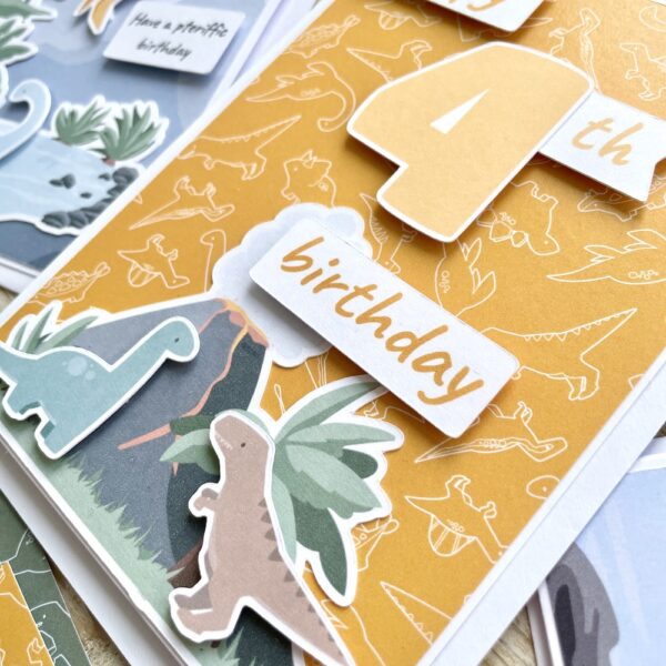 Dinosaur themed handmade 4th birthday card