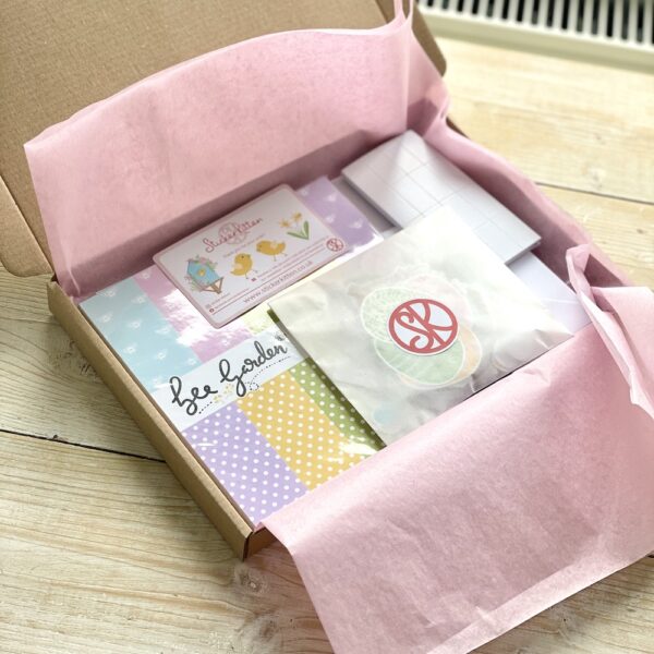 Easter card making kit packaged in an eco friendly box, wrapped in pink tissue paper