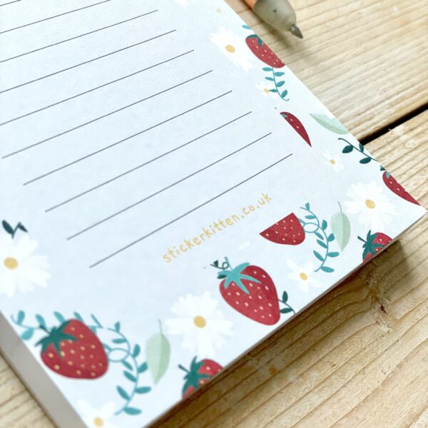 Cute strawberry to do list notepad - Pale green with strawberry pattern, ruled lines and stickerkitten.co.uk printed at the bottom.